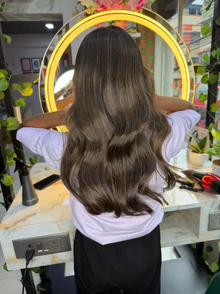 Long wavy hair colour styling result — Shape Shifters Hair Services