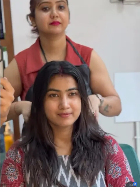 Hair styling session in progress at Shape Shifters