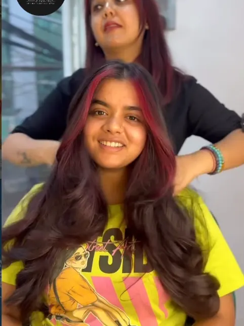 Vibrant red-toned hair colour reveal at Shape Shifters